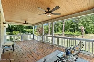 13290 New Britton Highway E, Nakina, NC 28455 – photo 10: Relaxing Covered Porch
