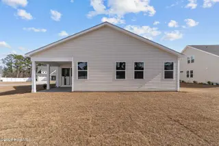 692 Edgeside Drive SE, Bolivia, NC 28422 – photo 20: Back yard