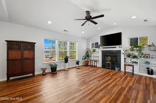 1281 Spring Lake Drive, Southport, NC 28461 — 3-bedroom home, Southport, NC, photo 6 of 46: Living Room with Fireplace