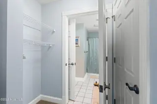 908 Resort Circle Unit 512, Sunset Beach, NC 28468 — 2-bedroom condo in Colony II, Sunset Beach, NC, photo 21 of 39: Primary Bathroom