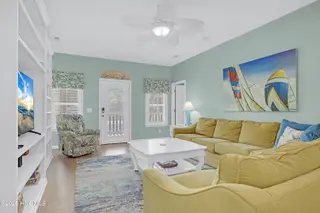 409 Womble Street, Oak Island, NC 28465 – photo 10: Cozy Living Room