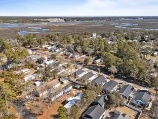 217 NE 75th Street, Oak Island, NC 28465 – photo 5: 9-web-or-mls-DJI_20260212110257_0006_D -