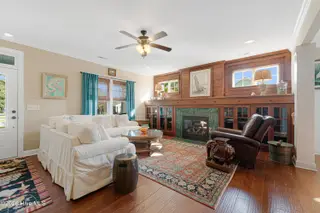 301 Hedrick Street, Beaufort, NC 28516 – photo 11: Living room with gorgeous fireplace