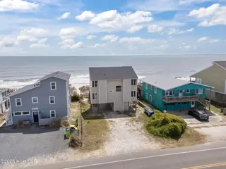 3909 W Beach Drive, Oak Island, NC 28465 – photo 8: 6-web-or-mls-DJI_20260408135921_0409_D