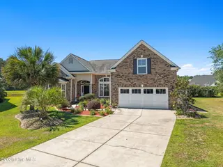 693 Donmovin Court NW, Calabash, NC 28467 — 4-bedroom home in Meadowlands, Calabash, NC, photo 1 of 59