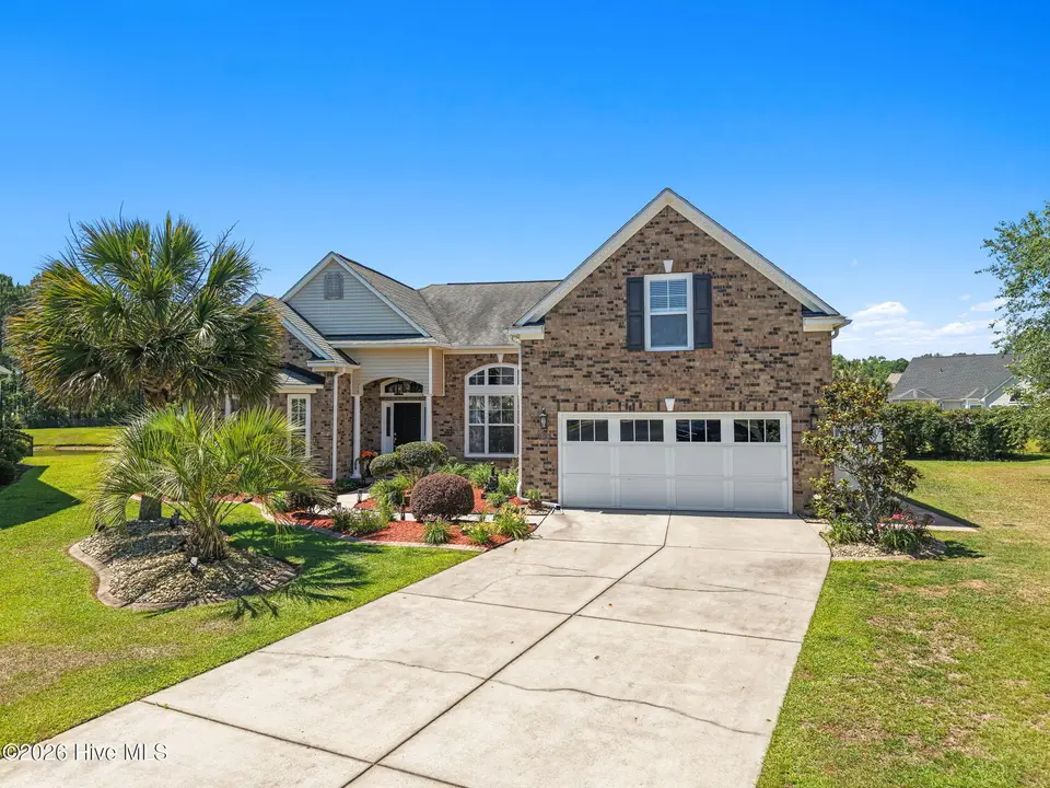 693 Donmovin Court NW, Calabash, NC 28467 — 4-bedroom home in Meadowlands, Calabash, NC, photo 1 of 59