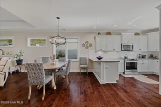8309 Oak Abbey Trail NE, Leland, NC 28451 — 3-bedroom home in Compass Pointe, Leland, NC, photo 13 of 66: KItchen/Dining Area
