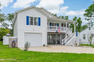 1803 W Yacht Drive, Oak Island, NC 28465 – photo 3: Front side elevaiton