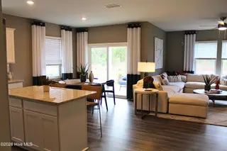208 Ocean Pointe Boulevard SE 5301, Bolivia, NC 28422 – photo 8: MODEL-KITCH-LIVING
