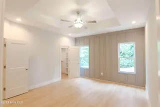 2500 Brookhaven Drive, Kinston, NC 28504 – photo 13: Master bedroom with accent wall