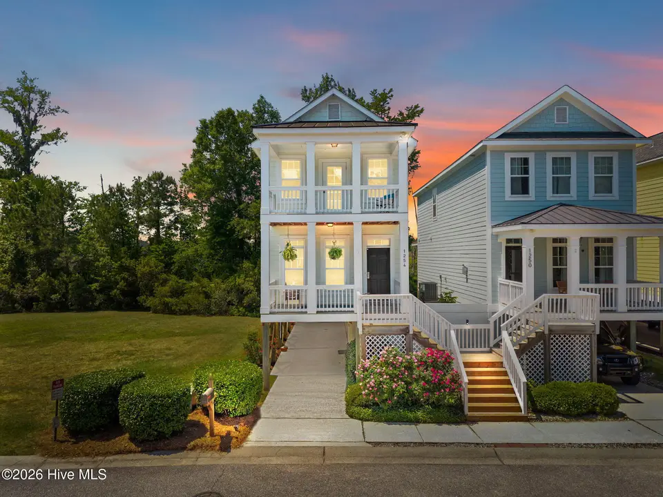 1254 Charleston Common Drive, Leland, NC 28451 – photo 1 of 48: 1-web-or-mls-DJI_20260424125629_0408_D_2