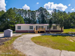 6324 Old Shallotte Road NW, Ocean Isle Beach, NC 28469 — 3-bedroom manufactured home, Ocean Isle Beach, NC, photo 2 of 51: 02-DJI_20260929114310_0001_D-HDR-Edit