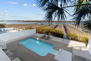 6634 Kings Lynn Drive, Oak Island, NC 28465 – photo 5: 39-web-or-mls-BTS06168