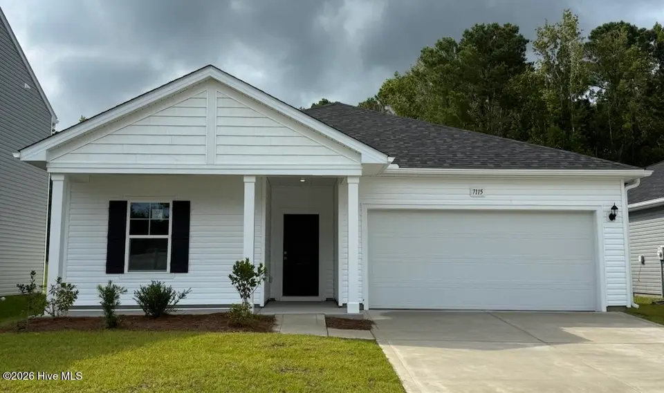 7115 Woodline Drive SW, Sunset Beach, NC 28468 – photo 1 of 2
