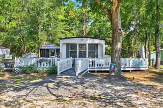 235 Live Oak Drive, Sunset Beach, NC 28468 – photo 1: 01-www.kahunaphoto.com-01414070_KDP01414