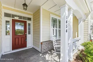 1454 Dunes Boulevard SW, Ocean Isle Beach, NC 28469 – photo 4: Perfect for front porch sittin'