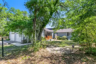 2903 E Oak Island Drive, Oak Island, NC 28465 – photo 22: wooded rear yard