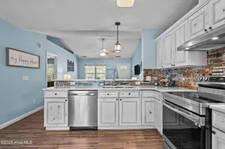 213 NE 48th Street, Oak Island, NC 28465 – photo 10: 33-web-or-mls-Photo Aug 21 2025, 11 02 2