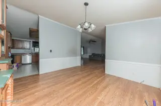 210 Creek Bank Drive, New Bern, NC 28560 — 3-bedroom manufactured home in Creekwater Haven, New Bern, NC, photo 17 of 58: DiningRoom