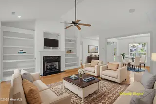 2904 Legends Drive, Southport, NC 28461 — 3-bedroom home in St James, Southport, NC, photo 9 of 71: 2904-legends-dr-00008 - living room w di