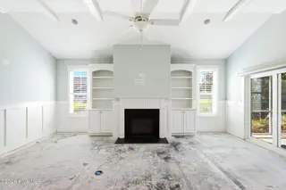 1454 Dunes Boulevard SW, Ocean Isle Beach, NC 28469 – photo 9: Gas fireplace w/built-in bookcases