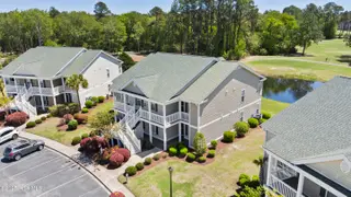 932 Great Egret Circle SW 3, Sunset Beach, NC 28468 – photo 2: mls-DJI_20250416130516_0693_D