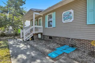 135 NE 36th Street, Oak Island, NC 28465 – photo 4: 37-Final 135 NE 36th St OKI-RJREM-7122