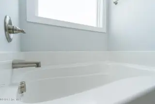 610 Bright Harvest Drive, Maysville, NC 28555 – photo 23: Primary Bath - Soaking Tub