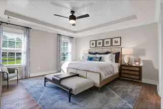 623 Heart Pine Avenue, Wilmington, NC 28411 – photo 17: Primary Bedroom - Nantanaha - Cottages a