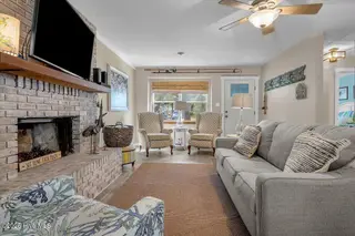 209 NE 56th Street, Oak Island, NC 28465 – photo 8: 19-Final 209 NE 56th St OKI-RJREM-9423