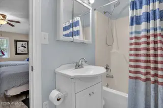 209 NE 56th Street, Oak Island, NC 28465 – photo 23: 31-Final 209 NE 56th St OKI-RJREM-9462