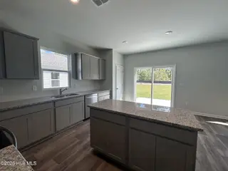584 Coronado Avenue SE 20, Leland, NC 28451 – photo 9: Gray Cabinets & Granite Countertops