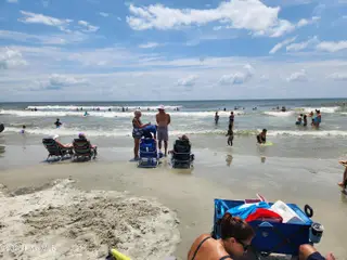 305 Planters Ridge Drive SW, Sunset Beach, NC 28468 — 3-bedroom home in Sea Trail Plantation, Sunset Beach, NC, photo 16 of 17: Gentle surf at Sunset Beach