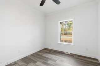 9163 Southern Boulevard SE, Winnabow, NC 28479 — 3-bedroom home, Winnabow, NC, photo 22 of 28: Bedroom 2