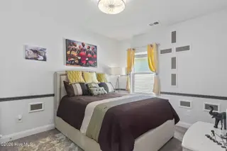 9410 Barnstormer Drive NW, Calabash, NC 28467 — 3-bedroom home in Eagle Run, Calabash, NC, photo 18 of 47: Bedroom 2