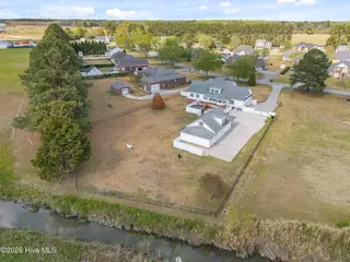 819 Badger Circle, Greenville, NC 27834 — 3-bedroom home in Northwoods, Greenville, NC, photo 6 of 62: 7-web-or-mls-DJI_20260331152503_0203_D