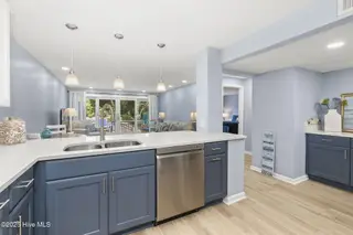 331 Salter Path Road 104 Beachwalk, Pine Knoll Shores, NC 28512 – photo 12: Updated kitchen w/ bar seating