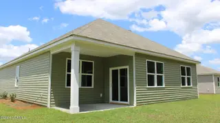 1233 Woodhouse Drive NW, Ash, NC 28420 – photo 3: Aria_H_Back_Side