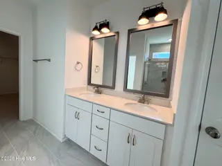 2012 Red Woodpeckers Court, Leland, NC 28451 — 3-bedroom home in Terrapin, Leland, NC, photo 15 of 23: Primary Vanities