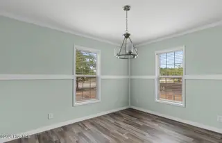 6823 Lewis Drive SE, Winnabow, NC 28479 – photo 8: Dining area