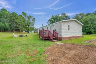 2216 Bell Williams Road, Burgaw, NC 28425 — 3-bedroom manufactured home, Burgaw, NC, photo 16 of 25: Side Exterior