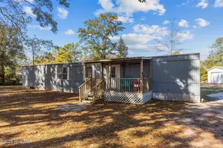 223 Pettiford Road, Peletier, NC 28584 — 3-bedroom manufactured home in Pettiford Point, Peletier, NC, photo 1 of 34: 1-web-or-mls-1S3A9904