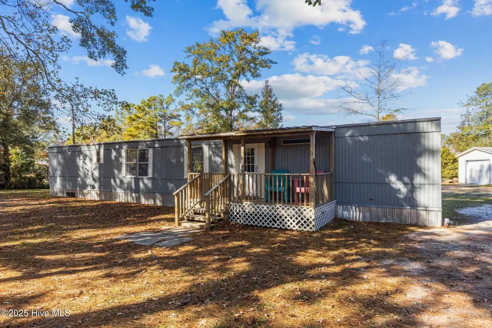 223 Pettiford Road, Peletier, NC 28584 — 3-bedroom manufactured home in Pettiford Point, Peletier, NC, photo 1 of 34: 1-web-or-mls-1S3A9904