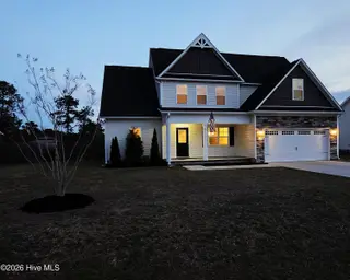 123 Sonia Drive, Hubert, NC 28539 — 3-bedroom home in Eastport, Hubert, NC, photo 5 of 75: Front L Twilight
