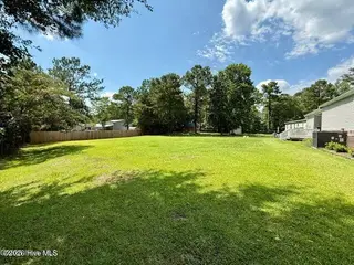 165 Hewett Burton Road SE, Leland, NC 28451 — 3-bedroom manufactured home in Sterling Oaks, Leland, NC, photo 4 of 32: 04-165 Hewett Burton Road SE