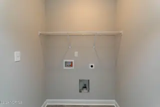 525 N Sycamore Street, Aberdeen, NC 28315 – photo 22: laundry closet
