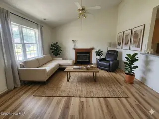 243 Parnell Road, Hubert, NC 28539 – photo 5: Living Room AI Staged