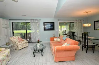 86 Cedar Tree Lane SW, Calabash, NC 28467 – photo 7: Living Room/Dining Room