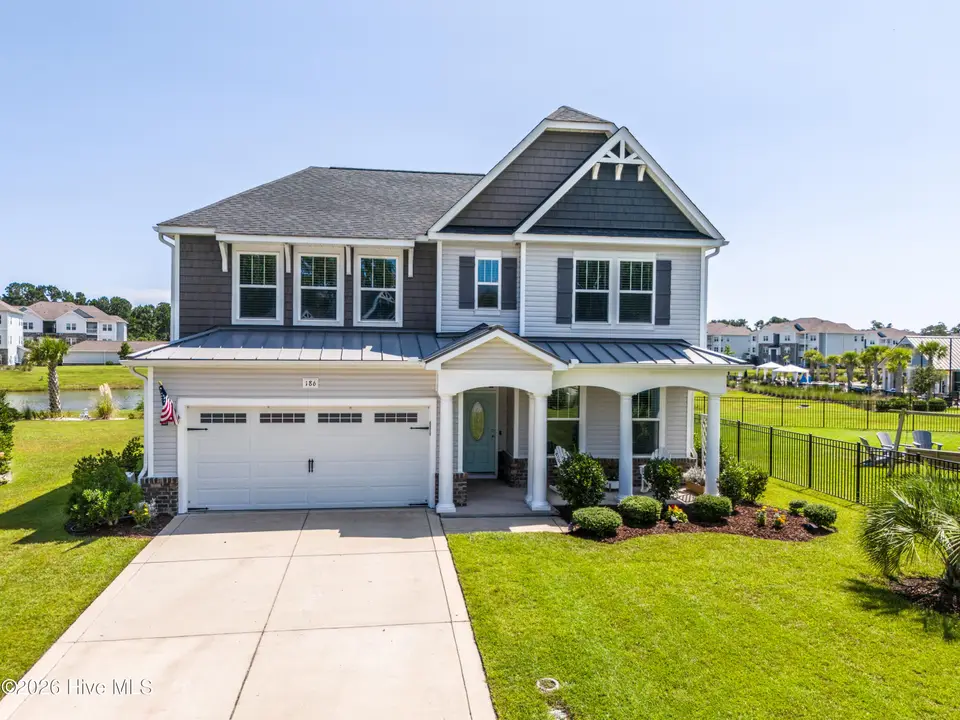 186 Violetear Ridge, Hampstead, NC 28443 — 4-bedroom home in Sparrows Bend, Hampstead, NC, photo 1 of 55