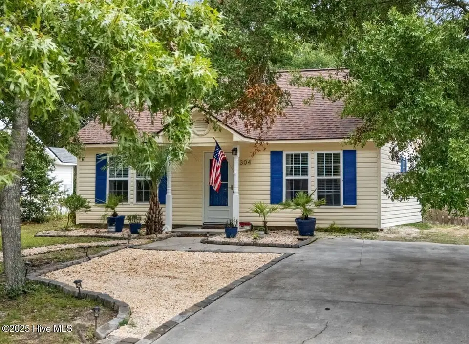 1304 E Oak Island Drive, Oak Island, NC 28465 – photo 1 of 38: Front of house